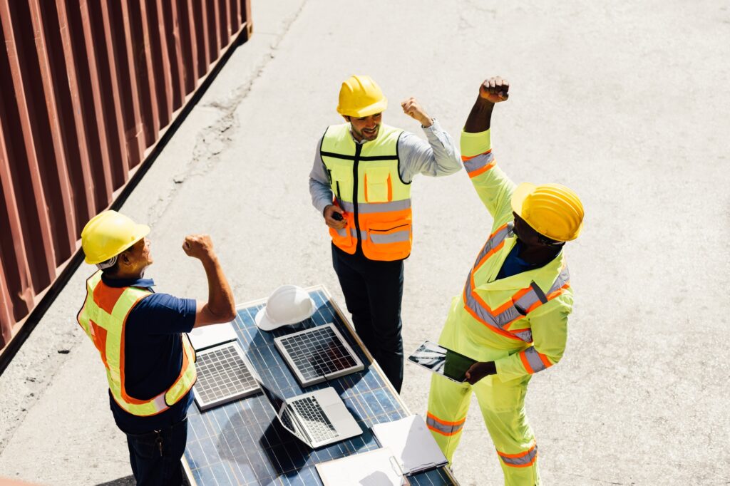 Group of teamwork warehouse worker working at cargo containers shipping